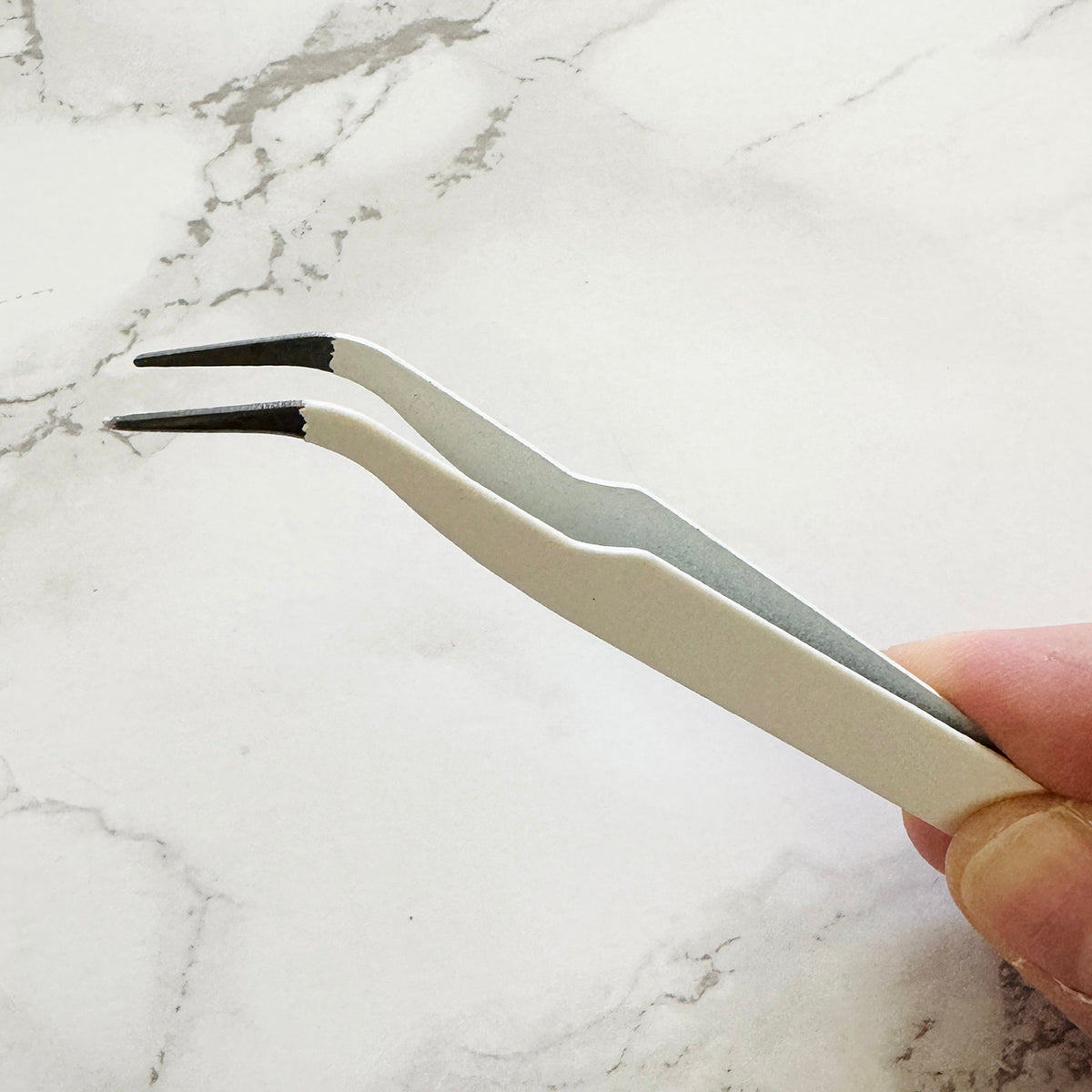 White Tweezers